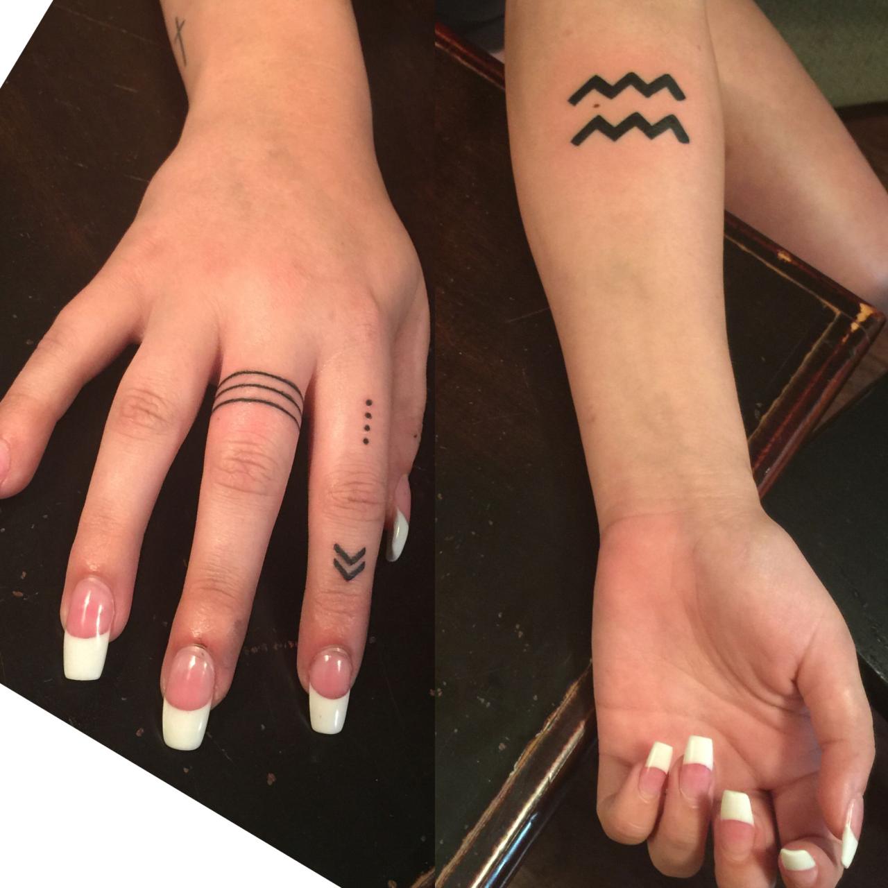 Aquarius Arm Tattoo & Simple Elegant Symbol Finger Tattoos By Brandon  Mckeever | Finger Tattoos, Aquarius Tattoo, Simple Finger Tattoo