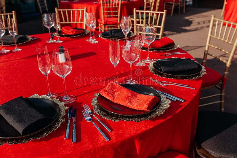 Guest Table Setting For Banquet In Black, Red And Gold Style. Elegant And  Luxury Dinner Arrangement: Decor, Tablecloth Stock Image - Image Of Detail,  Fork: 240695093